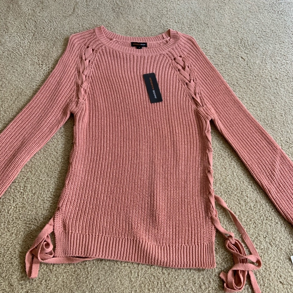 light pink sweater